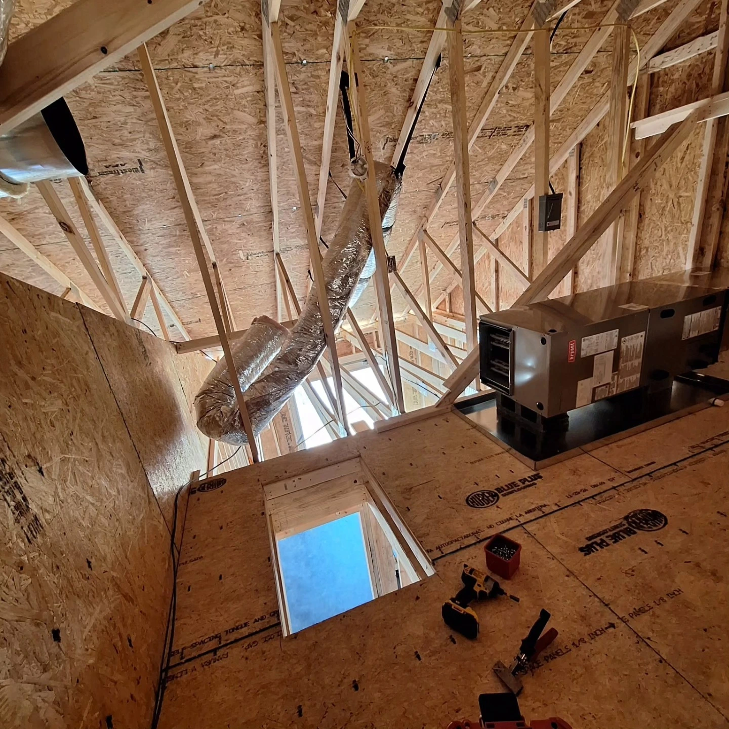 Complete HVAC system with properly installed ductwork in attic space