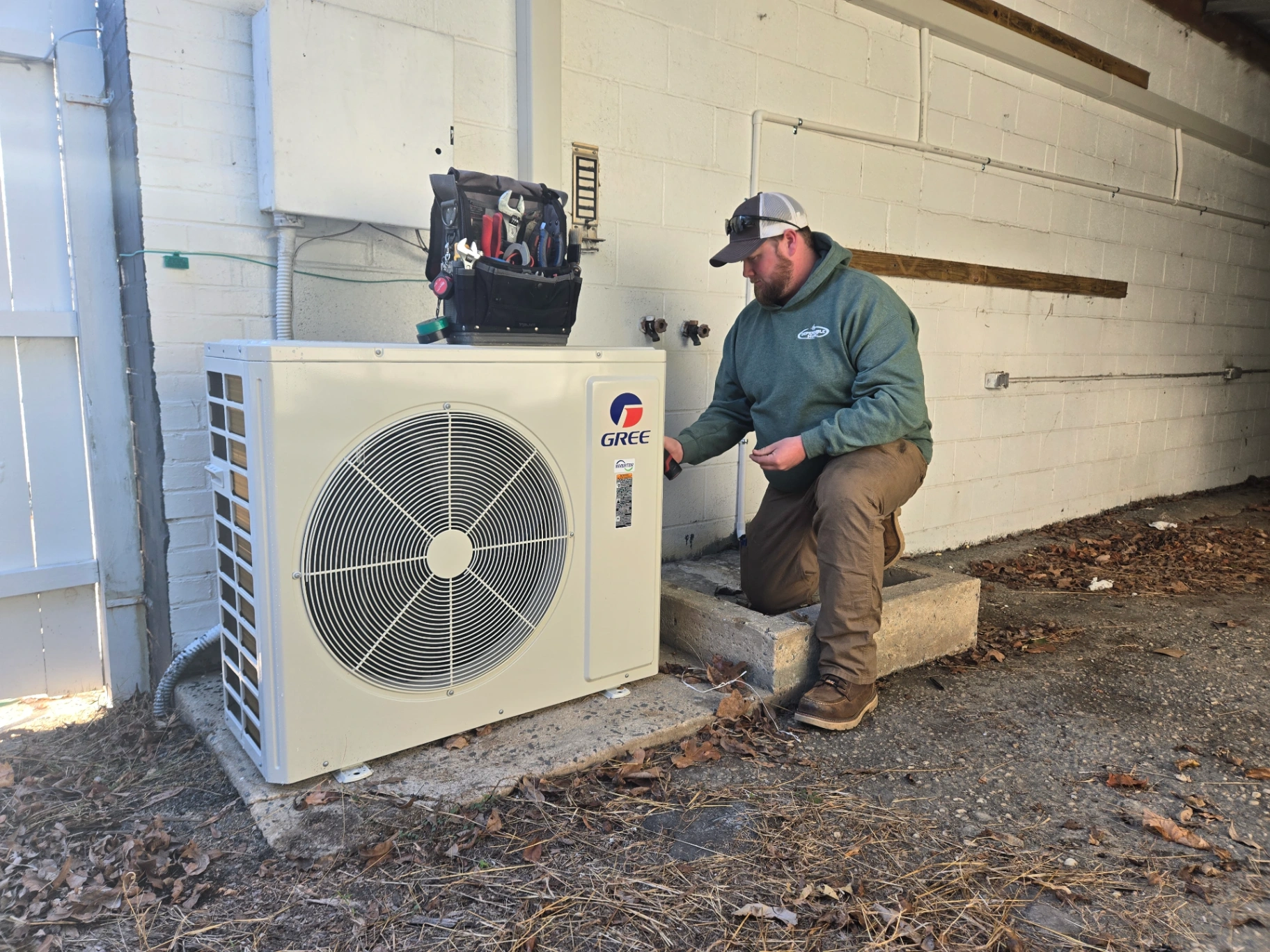 HVAC technician servicing GREE mini-split in Troy NC