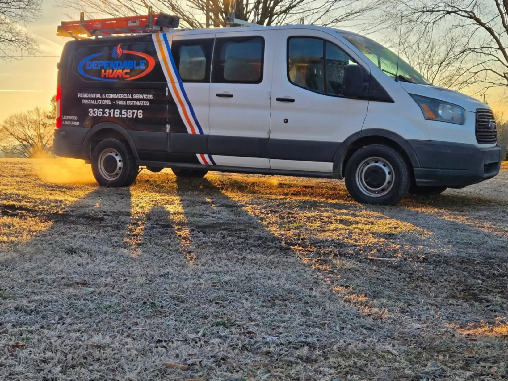 Dependable HVAC service van at sunrise